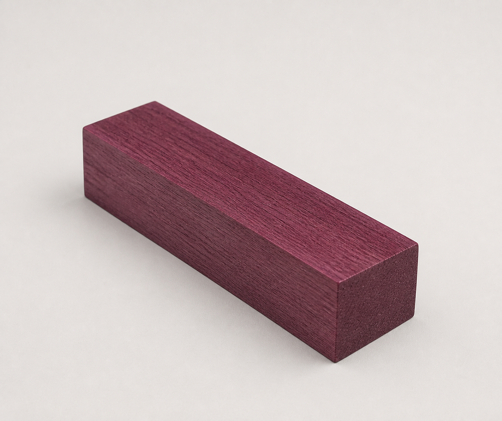 Angled view of a short Purpleheart wood block highlighting its dense grain and vivid purple color for cue building