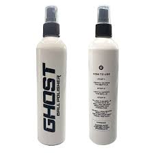 Two white Ghost Ball Cleaner & Polish spray bottles for cleaning and polishing billiard balls, shown on a white background.