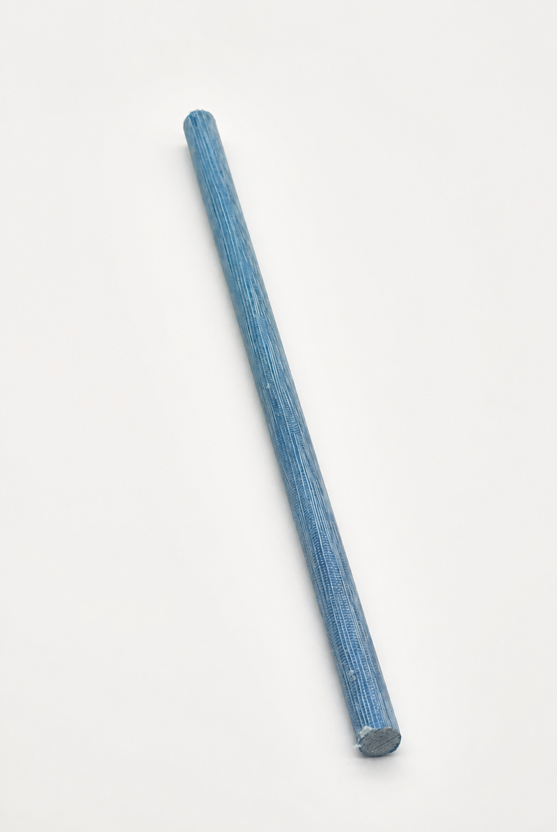 Blue canvas phenolic rod on white background