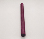 Round Purpleheart wood dowel blank standing upright, showing deep purple heartwood grain for cue building
